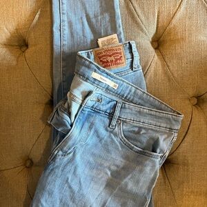 711 distressed skinny jeans